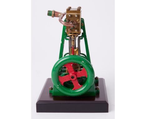 A Stuart 4 cylinder steam engine, 8" high.