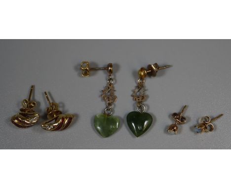 Three pairs of earrings including a a ruby and diamond pair.(B.P. 21% + VAT) 