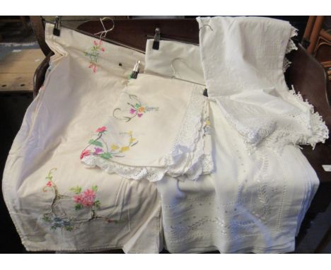 Four good quality vintage linen embroidered tablecloths, two with crochet trim. (4) 