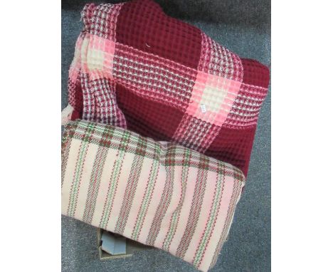 Two vintage woollen blankets: one check honeycomb and the other striped. (2)(B.P. 21% + VAT) 