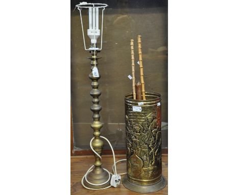 Brass candlestick converted to a table lamp, together with a brass stick stand with assorted items, folding shovel and two ba