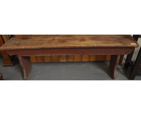 Rustic pine low bench with shaped sides.  (B.P. 21% + VAT) 