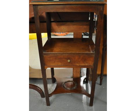 19th century mahogany lamp table/bedside cabinet, having glass top above an under tier, single drawer standing on square cham