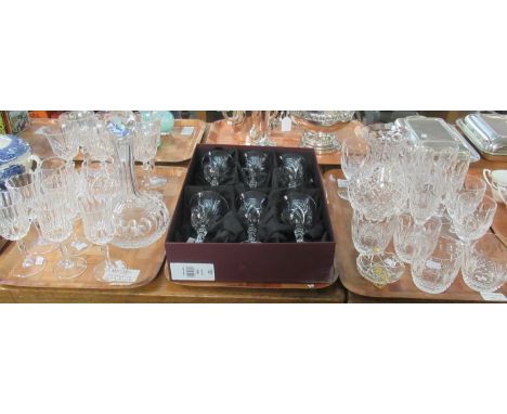 Three trays of glassware to include: two Redhouse Collection by Stuart Crystal sets of six wine glasses (one boxed), cut glas