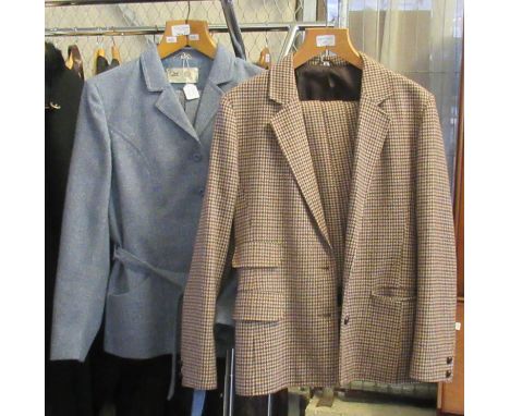 Two vintage woollen skirt suits (60's-70's): one houndstooth check with pleated skirt and the other light blue with a belted 