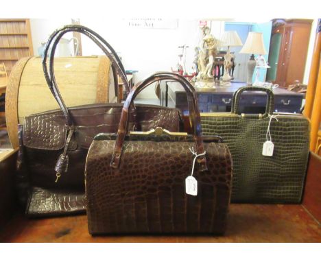 Three vintage bags; one crocodile skin, one leather in faux alligator design with suede lining and a faux crocodile skin brie