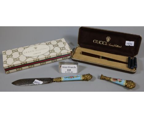 Gucci accessory collection: 'Firenze' fountain pen in original box together with floral enamel and gilt handled letter knife,