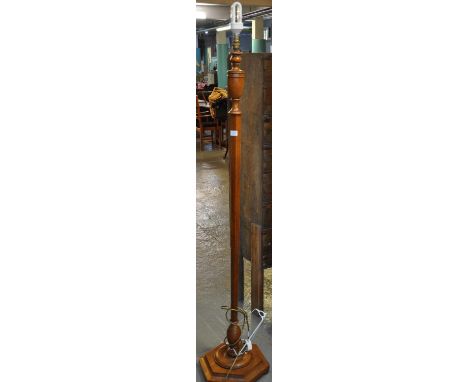 Modern oak standard lamp on geometric octagonal stepped base. (B.P. 21% + VAT) 