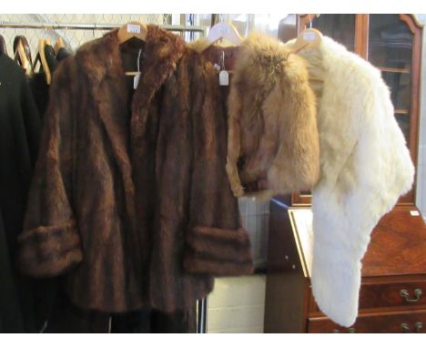 Three vintage fur items: one cream coloured rabbit fur stole, a fox fur stole and a dark brown 3/4 length fur coat. (3)(B.P. 
