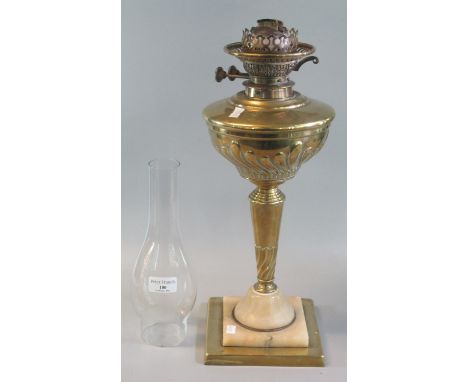 Early 20th Century double burner oil lamp, having brass reservoir on a brass and alabaster base. (B.P. 21% + VAT) 