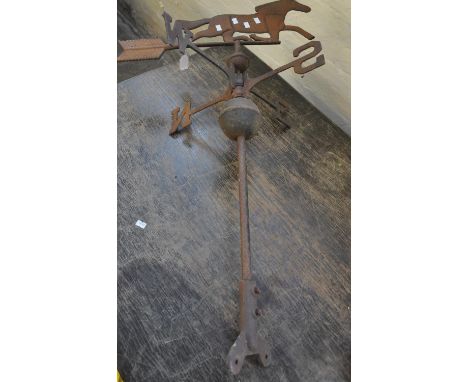 Weathered cast iron weather vane decorated with a horse. (B.P. 21% + VAT)Appears complete, but rusty and weathered condition.