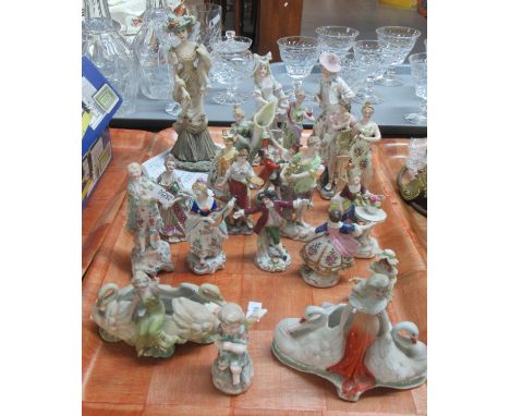 Tray of continental porcelain figures of ladies, gentlemen and one of a cherub, some spill vases and a tray with continental 