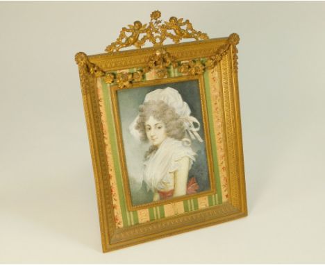 PORTRAIT MINIATURE.A large portrait miniature, hand painted by an unknown hand after John Dowman's portrait of Mrs Sarah Sidd