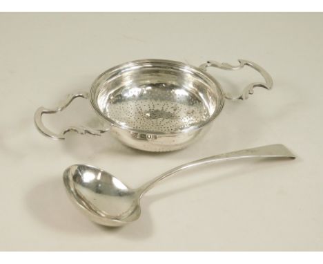 STRAINER ETC. A strainer, London 1911, width 17.7cm. Also, a Georgian ladle.