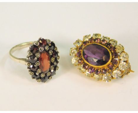 COSTUME JEWELLERY.A 935 standard silver dress ring, set with garnet & marcasite & a small Victorian paste set brooch.
