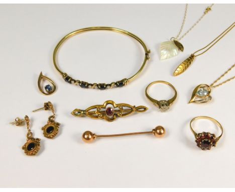 GOLD DRESS RINGS ETC. Two 9ct. gold dress rings, a 9ct. gold Edwardian bar brooch, a modern 9ct. gold bangle &amp; a quantity