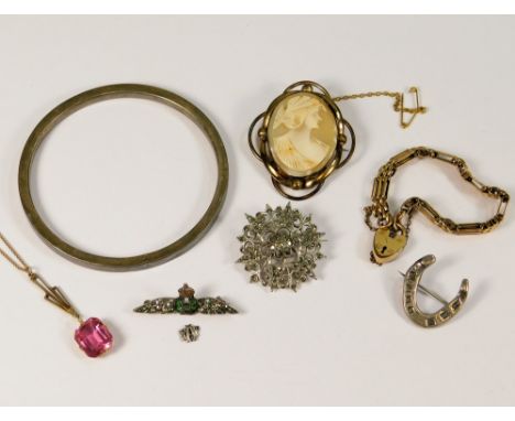 COSTUME JEWELLERY. A silver bangle, a cameo shell brooch &amp; other costume jewellery.