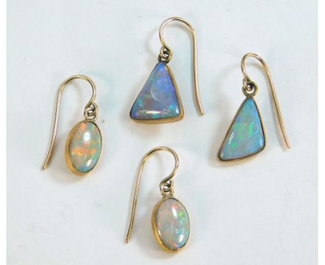 OPAL EARRINGS. Two pairs of 9ct. gold mounted opal earrings.