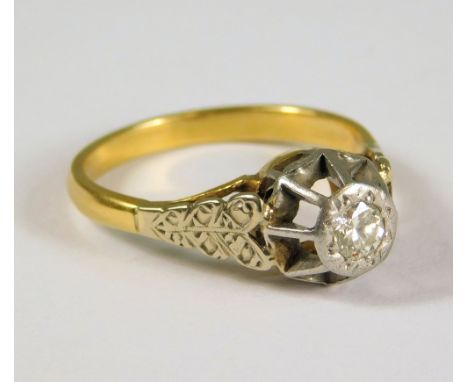 DIAMOND RING. An 18ct. gold, illusion set, solitaire diamond ring, (N).