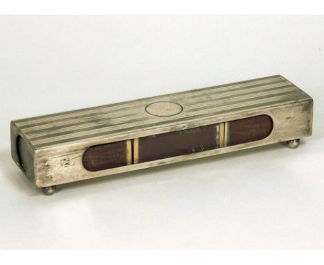 ELKINGTON &amp; CO. An Elkington &amp; Co. engine turned silver matchbox holder, for three standard sized boxes. London 1911.