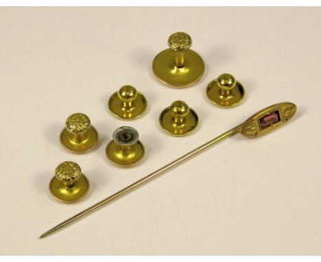 STICK PIN ETC. A Victorian stick pin in fitted box, also a set of three 12ct. gold studs &amp; a set of four other studs.