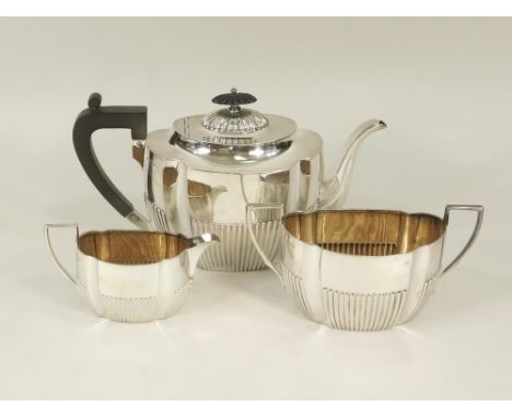 TEA SERVICE. A Victorian half fluted tea service. Sheffield 1893. Approx. 24oz.