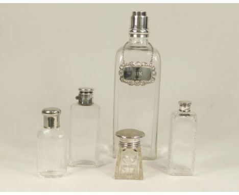 GIN FLASK ETC.An Edwardian silver mounted moulded glass gin flask with silver mounted cork stopper, Birmingham 1905, with lat