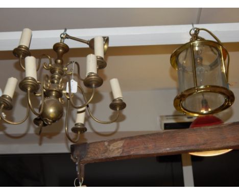 A Dutch style brass nine-branch ceiling light, a hall lantern and a fire extinguisher. (3)
