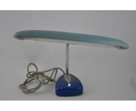 A post war desk lamp, the light blue torpedo shaped shade on a chromium adjustable stem, W. 34cm.