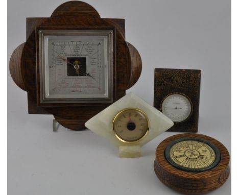 A mid-20th century oak cased aneroid barometer, square with a silvered dial, together with two thermometers and a perpetual c