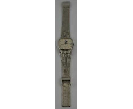 An Ebel gentleman's automatic wristwatch, the silvered dial with baton numerals and date aperture at the 3 o'clock position, 