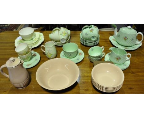 An Old Royal tea service, decorated with a foliate sprig on a cream ground, for six place settings including sandwich plate, 