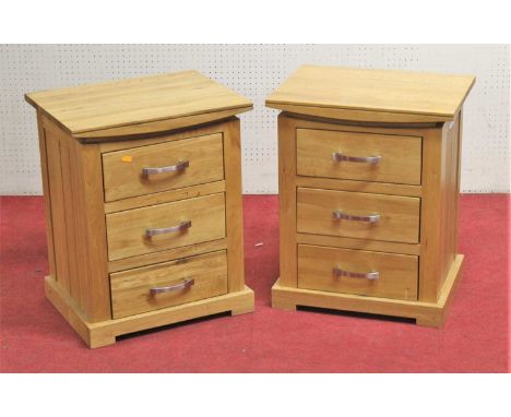 A pair of contemporary light oak three drawer bedside chests, each width 50cm