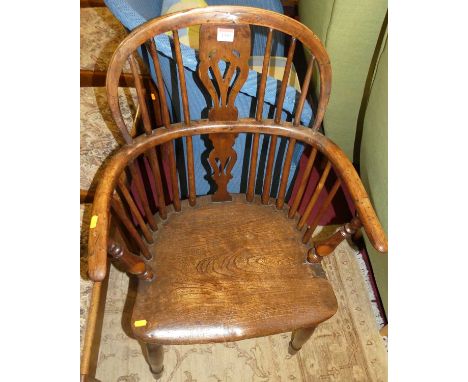 A 19th century elm, yew and fruitwood splatback Windsor chair, having a crinoline stretcher, width 54cmCondition report: Heig