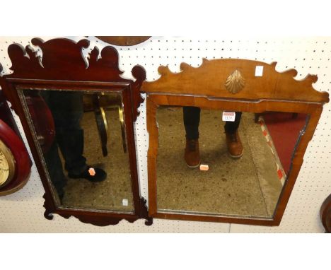 A 19th century mahogany fret carved wall mirror, 55 x 47cm; together with one other similar Chippendale style example, 67 x 4