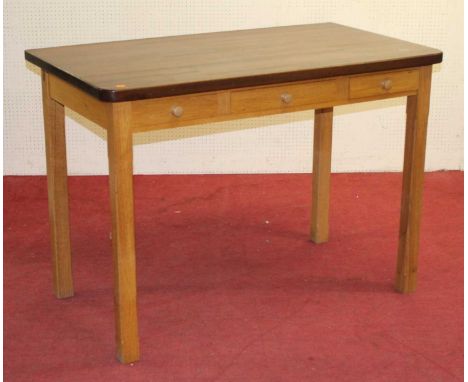 An Ochre contemporary light oak and mahogany topped round cornered three drawer kitchen preparation table, w.128cm