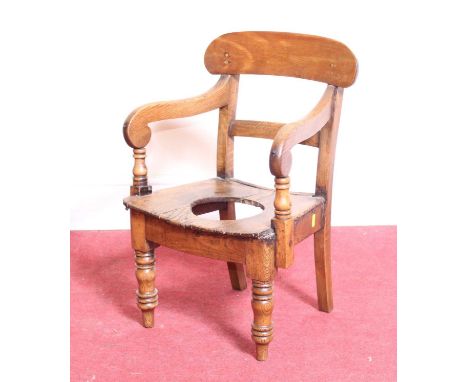 A child's elm commode elbow chair, w.38.5cm