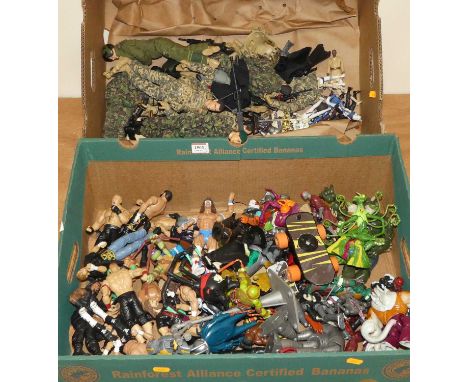 Two boxes containing a quantity of plastic action figures including Teenage Mutant Ninja Turtles, various wrestling figures, 