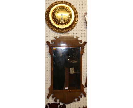 A circa 1900 mahogany fret carved rectangular wall mirror in the Chippendale taste, 82.5 x 46cm; together with a gilt decorat