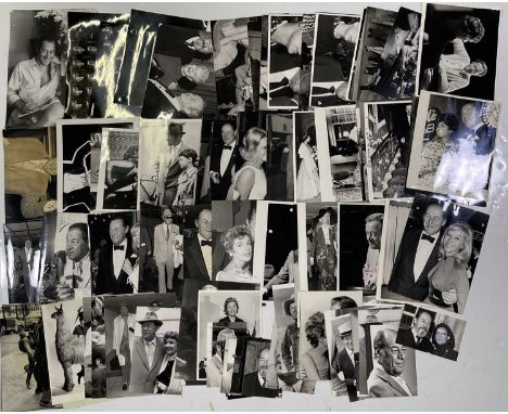 Approx 76 variously sized black and white press photographs depicting Rex Harrison, many vintage prints with press stamps/inf