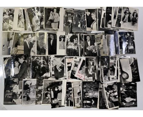 Approx 137 variously sized (many c 8x10") black and white press photographs depicting Elizabeth Taylor, many vintage prints w