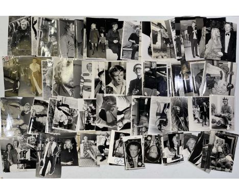 Approx 94 variously sized (many c 8x10") black and white press photographs depicting Richard Harris, many vintage prints with