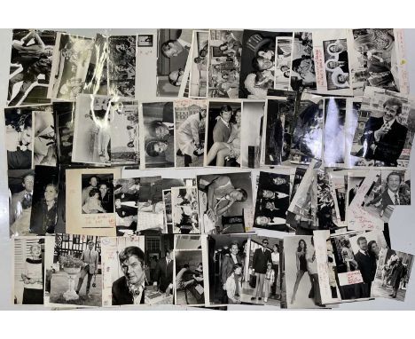 Approx 189 variously sized (many c 8x10") black and white press photographs depicting Roger More, many vintage prints with pr