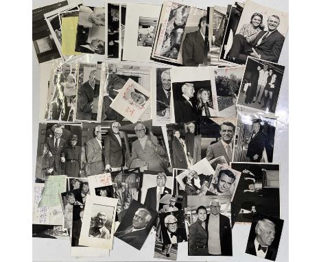 Approx 76 variously sized black and white press photographs depicting Cary Grant, many vintage prints with press stamps/info 