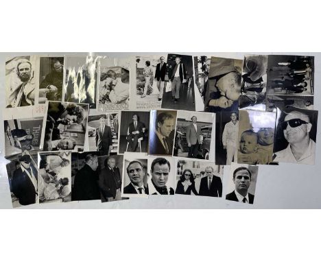 Approx 28 variously sized (many c 8x10") black and white press photographs depicting XXXXXXXXXXX, many vintage prints with pr