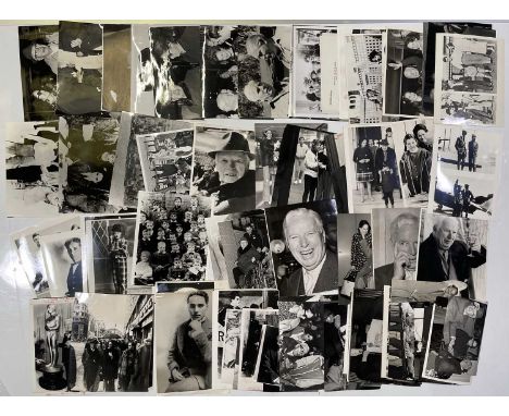 Approx 72 variously sized black and white press photographs depicting Charlie Chaplin, many vintage prints with press stamps/