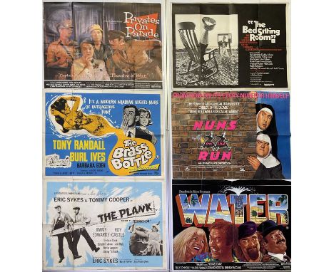 A collection of various film-related items to include six folded UK quad film posters for Water (1985), The Brass Bottle ( 19
