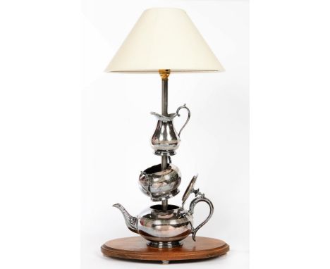 A TABLE LAMP INCORPORATING A THREE PIECE SILVER PLATED TEA SERVICE, WITH LAMPSHADE, 64CM H OVERALL