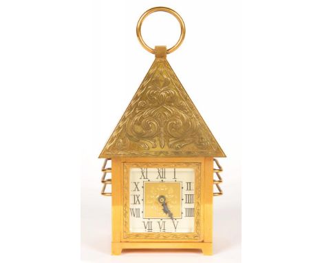 A FRENCH BRASS LANTERN SHAPED TIMEPIECE, THE SQUARE SILVERED DIAL INSCRIBED JUST, MADE IN FRANCE, THE MOVEMENT WITH PLATFORM 
