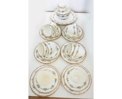 A ROYAL DOULTON BONE CHINA TEA SERVICE, DECORATED WITH TRAILING ROSES IN GILT BORDER, C1920